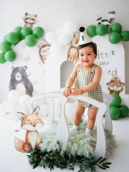 A "Little and Loved" woodland animal theme for a first birthday. This little explorer is ready for an adventure.