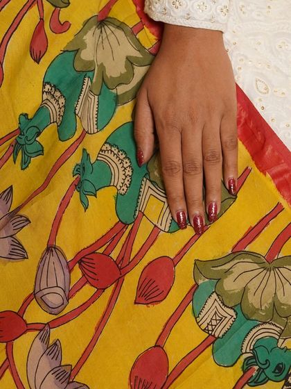 This is a glimpse into my Kalamkari Edition, featuring a wide array of hand-painted dupattas and fabrics from the Indralokam series. Each piece is a unique story, available for you to customize into your dream outfit.