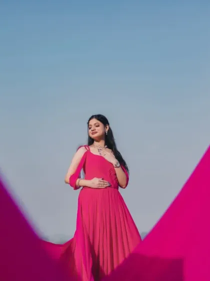 A creative shot using the gown's trail to frame the bride. This shows the versatility of our infinity trail gowns for artistic and unique pre-wedding photography.