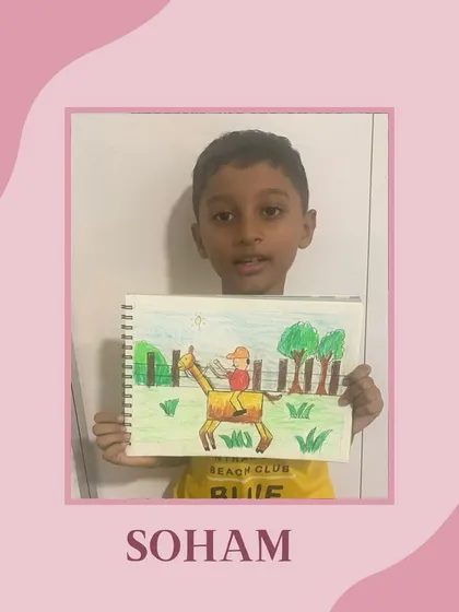 Soham with his wonderful drawing of a person riding a horse. Our classes encourage students to draw what they see and imagine.
