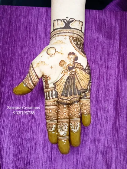 The complete Karwachauth hand design, with the portrait as the centerpiece, ready to be adorned for the festival.