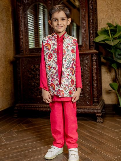 A full-length view of our pink kurta paired with a floral Bundi jacket. The combination is fresh, modern, and perfect for a daytime wedding event or festive gathering.