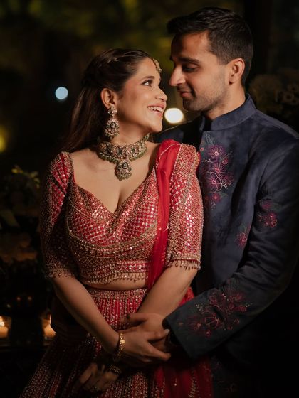 A loving embrace. The makeup is perfectly balanced, glamorous yet not overpowering, letting the couple's connection shine.