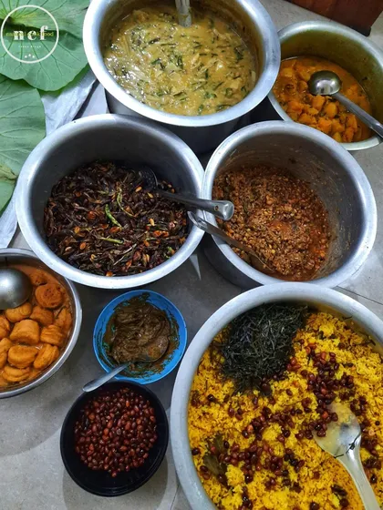 All the components of our NCF Khechri meal ready to be assembled. We prepare everything fresh, from the rice and lentils to the various curries and toppings.