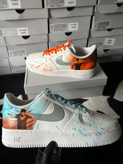 Another view of the "Salaar" custom sneakers, held up to show the detailed character art.