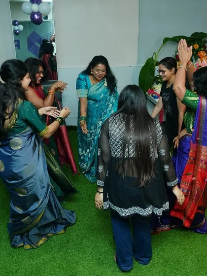 Another angle of our members enjoying the festive dance during the Ganesh Chaturthi celebrations at the gym.
