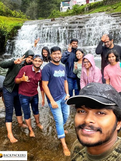 Having a splash at a waterfall in Kodaikanal. Our trips are all about having fun.