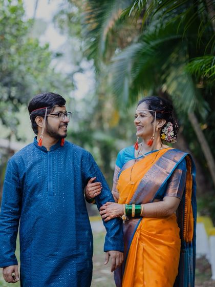 A happy, candid walk through the gardens after a pre-wedding ritual. We love to capture these relaxed moments of connection between the couple.