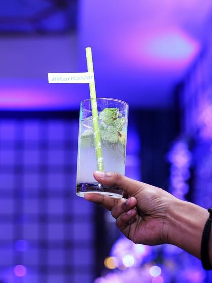 A close-up of a classic Mojito, perfectly muddled with fresh mint and lime. It’s a simple, refreshing, and always popular choice for any event.