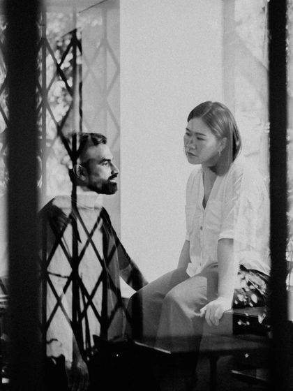 Another shot of us, caught in a moment of conversation. We are partners in life and in business, and our different strengths are what make our team work so well.