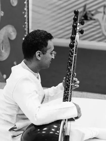 A black and white portrait from the Ramagya School event, capturing the reflective side of the performance.