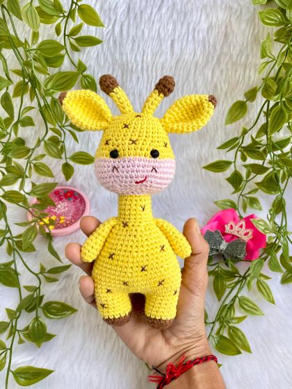 My bestseller giraffe doll is always a favorite. With its long neck, sweet smile, and spotted pattern, it's a cheerful and friendly companion for any child. This one is a larger size for extra big hugs.