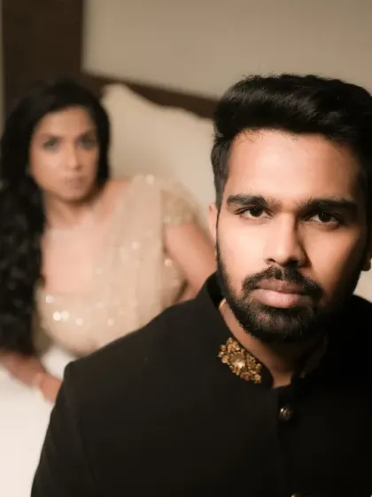 A powerful, direct-to-camera portrait of the groom. This kind of shot has a strong, confident feel, perfect for a magazine-style album.
