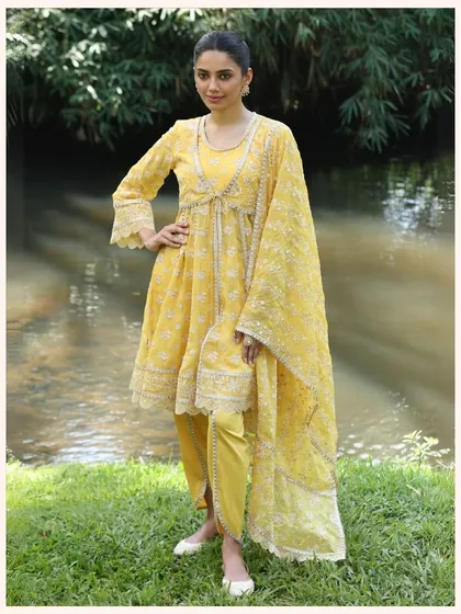 This sunny yellow anarkali set is sure to brighten your day. It's lightweight, comfortable, and perfect for a haldi ceremony or festive lunch.