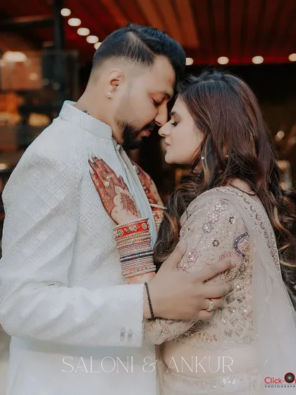 An intimate couple portrait from an engagement ceremony. We use soft lighting and close framing to capture the deep connection and affection between the couple as they begin their journey together.