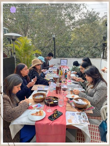 Another shot of our transformative Sunday Vision Board Party. It's a space to connect with like-minded individuals, enjoy delicious snacks, and focus on creating a visual map for your future aspirations.