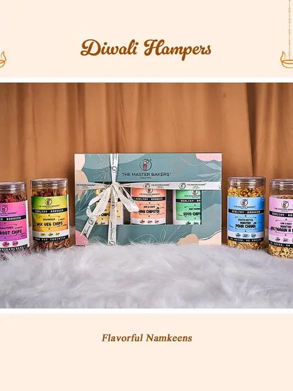 Our Flavorful Namkeens Diwali Hamper, which includes a variety of our healthy baked chips and savory mixes. It's a thoughtful gift for friends, family, and clients.