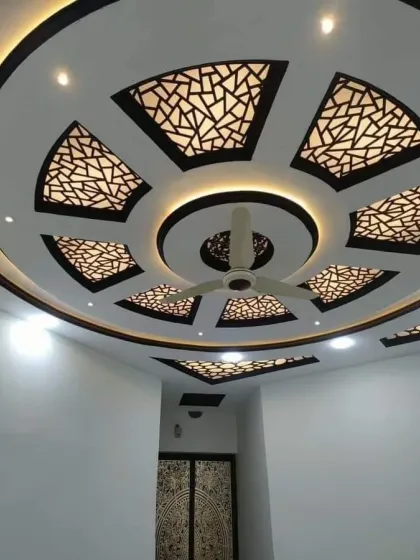 For a touch of pure elegance, I specialize in intricate backlit jali work. This design uses a detailed geometric pattern, creating a stunning visual effect that adds depth and a premium, decorative look to the ceiling.