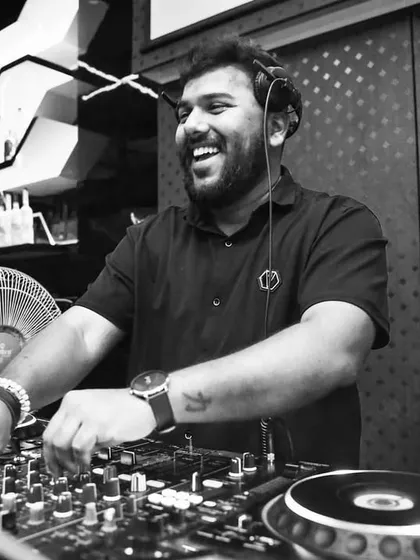 A happy moment behind the console at Play The Lounge. My goal is always to create a positive and energetic atmosphere.