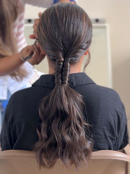 A modern fishtail pony, a chic and intricate style for any occasion.