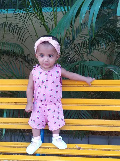 My own little model, baby Qirat, flaunting the Candyline Summer Headband. It's a beautiful lacy design that's perfect for warm weather.