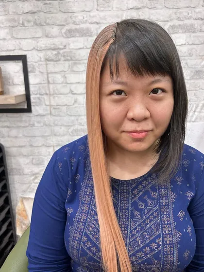 Another example of our swatch test. Seeing the color against the skin is a crucial step in our consultation process to ensure the tone is just right.