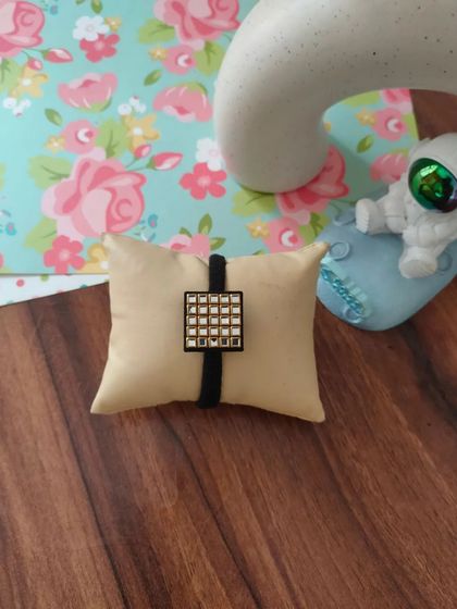 My collection of decorative elastic hair bands. Each one features a unique handmade centerpiece, including gotapatti, Kundan work, zardozi, and bead embroidery.