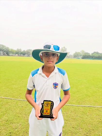 Apurv Tyagi, our captain cool, with his Player of the Match award.