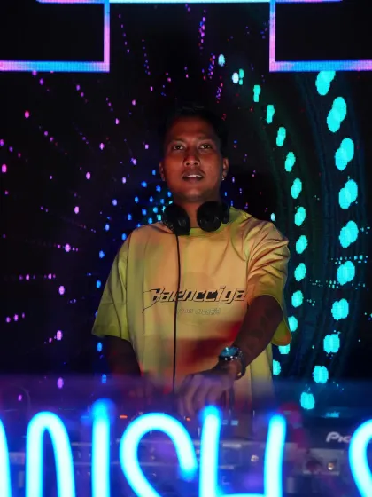 A cool, neon-lit portrait from a themed event. I enjoy adapting my look and feel to match the party's atmosphere.