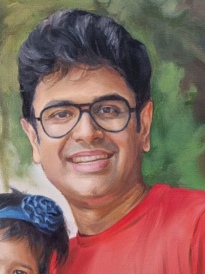 A close-up of the father's smiling face.