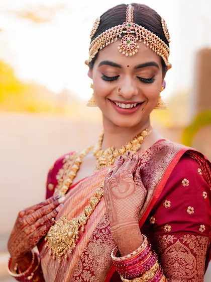 A bridal portrait is more than just a photo; it's a story of grace and anticipation. I loved capturing the intricate details of Suhaashini's traditional South Indian bridal look, from her temple jewelry to her radiant smile.