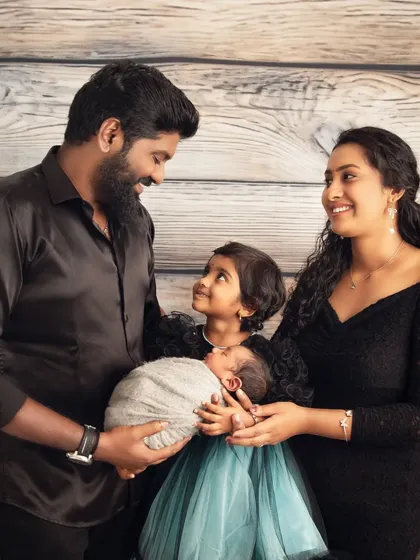 A new baby brings a new dimension of love to a family. I love capturing these early connections, with parents and siblings gazing at the newest member. This is a complete family portrait, a memory for everyone to cherish.
