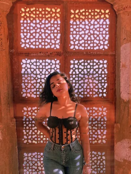 A moment of quiet contemplation. This photo, taken in a beautiful architectural setting, shows my appreciation for aesthetics and my more introspective side.