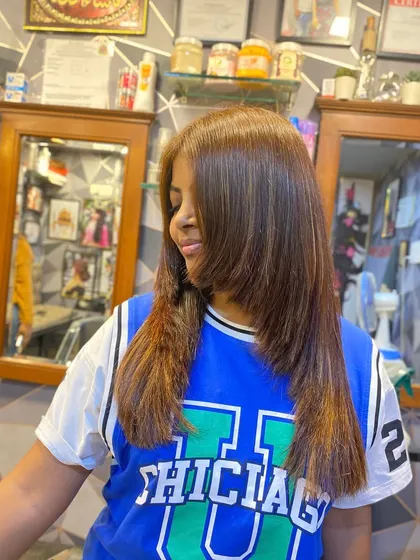 A side profile showing the soft and natural-looking highlights. This colouring technique is low maintenance and grows out beautifully.