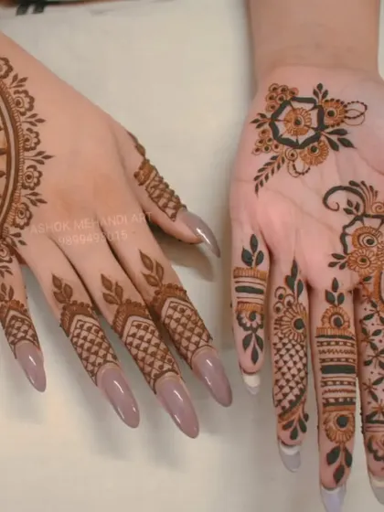This is a great example of a modern, asymmetrical look. The back of the hand has a simple cuff and finger details, while the palm features a light, floral bail (vine) design.