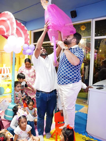 The excitement builds as everyone gets ready for the piñata. This classic party game is always a hit and a great way to add some action to the celebration.