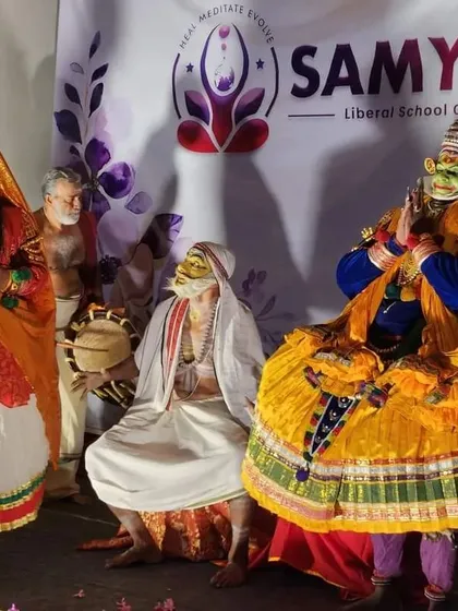 Spirituality is also a celebration of culture and life. Here, participants witness a vibrant, traditional Kathakali performance during our Kerala retreat, an experience that connects us to the rich artistic soul of the land.