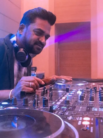 A DJ at the console during our NYE event at the Radisson Blu. I partner with premium hotels to host large-scale, high-quality holiday celebrations.