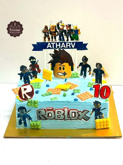 A Roblox theme cake for a 10th birthday party. This chocolate truffle cake is decorated with edible images of Roblox characters and game elements, bringing the virtual world to the celebration.