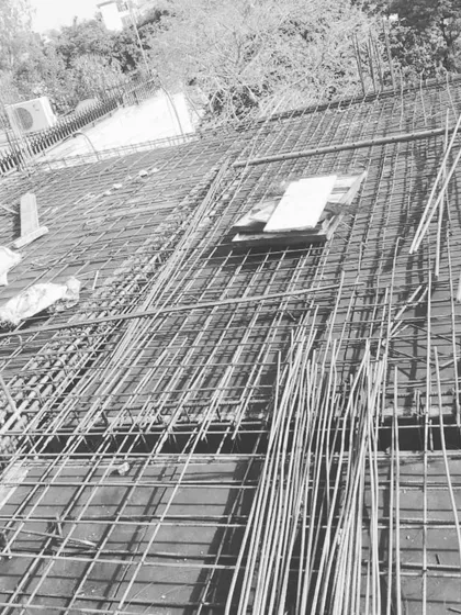 A detailed look at the reinforcement mesh on the rooftop. Precision at this stage is key to ensuring the building's long-term durability and safety.