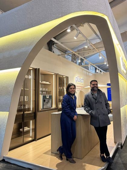 A photo with Sukriti, Partner at Plüsch, at the completed booth. Successful collaborations are built on shared vision and healthy debate, and this project was a testament to a partnership that resulted in a show-stopping design.
