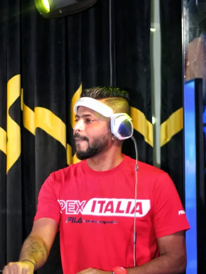 A portrait of me in my element, wearing my signature headphones and focused on the music.