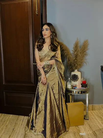 This metallic gold pre-draped saree is another one of my own designs. I wanted to create something glamorous and easy to wear for sangeets or cocktail parties.