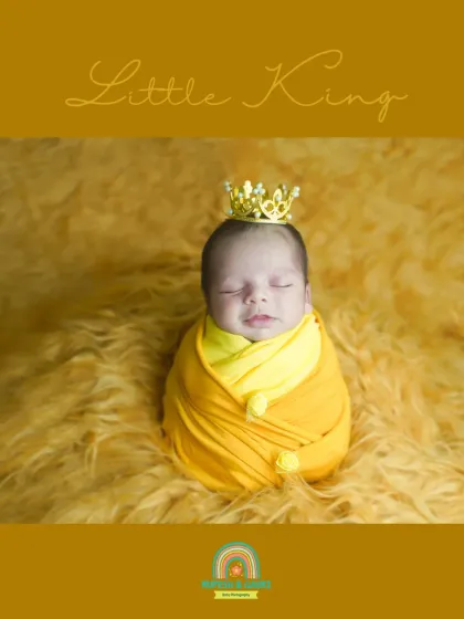 A portrait of our "Little King," peacefully asleep and wrapped in warm yellow tones. The tiny crown adds a touch of royalty to this classic newborn pose.