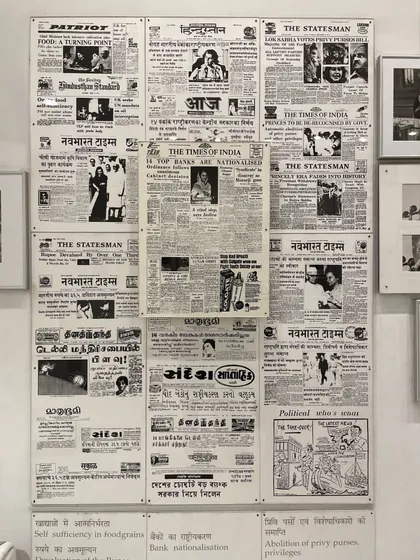 A collage of newspaper front pages from the time of Indira Gandhi's tenure. The museum uses these archival media clippings to document major political events and public discourse during her time as Prime Minister.