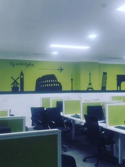 A wide shot of a travel themed wall decal I installed in a large office. These vinyl graphics are a great way to add branding or personality to a corporate space.