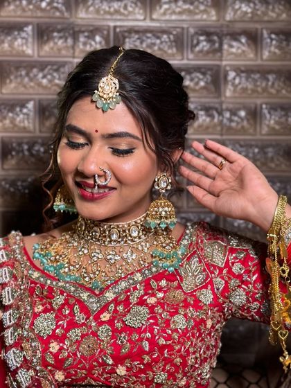 Another happy moment, her makeup looks fresh and radiant.