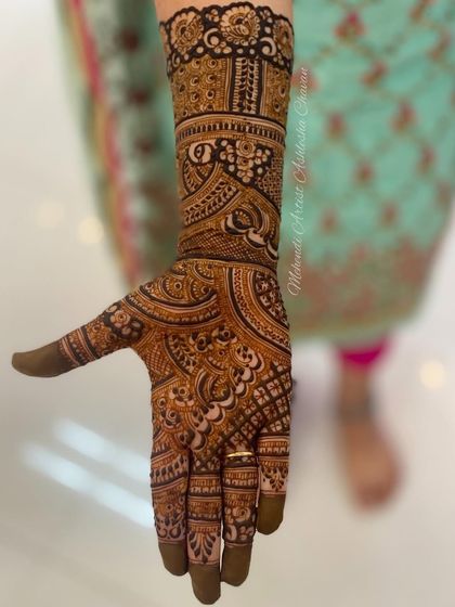 A single hand from a bridal set, showing the level of detail that goes into every part of the design.