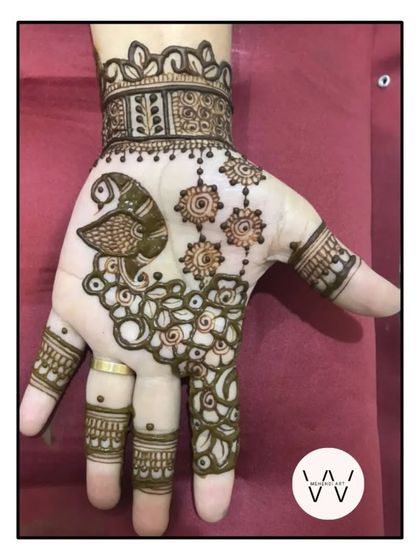 A simple peacock design for a bridesmaid.