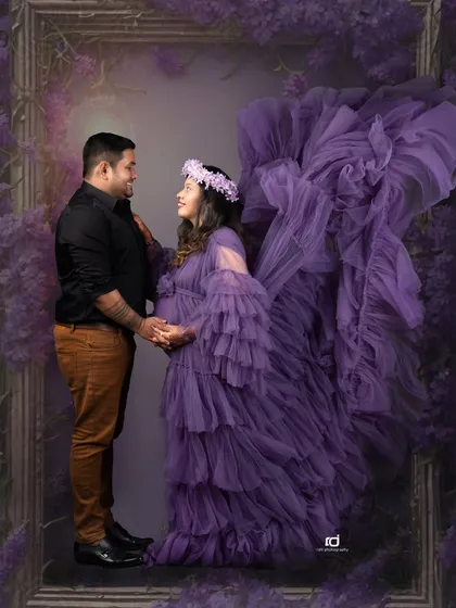 Creating a little bit of magic for your maternity session. This mother-to-be looks absolutely radiant in this flowing purple gown, set against a dreamy, enchanted forest backdrop that celebrates the fairy tale of new life.
